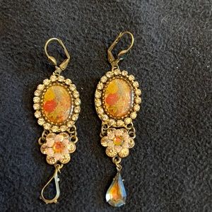 Vintage style dangling earrings. Lower hanging stone is missing.